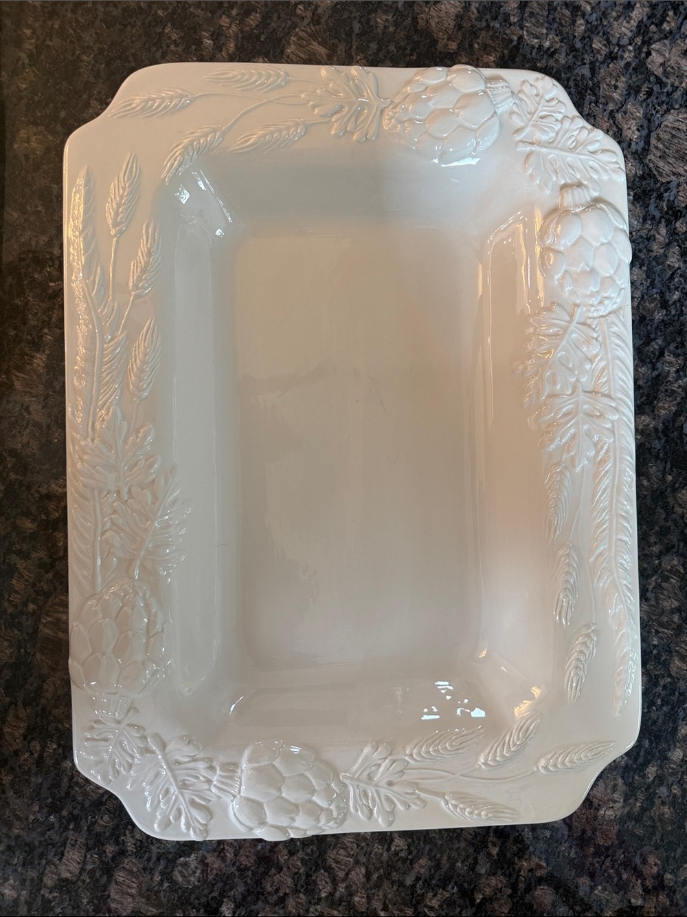 Second White Embossed Ceramic Serving Platter - Has small chip